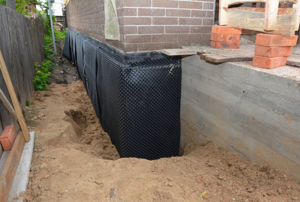 Happy homeowners after waterproofing job in Martinsburg